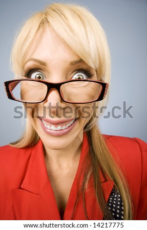 stock-photo-happy-woman-wearing-glasses-in-red-with-a-big-smile-14217775.jpg