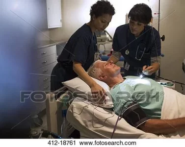 two-doctors-attending-patient-in-stock-image__412-18761.webp